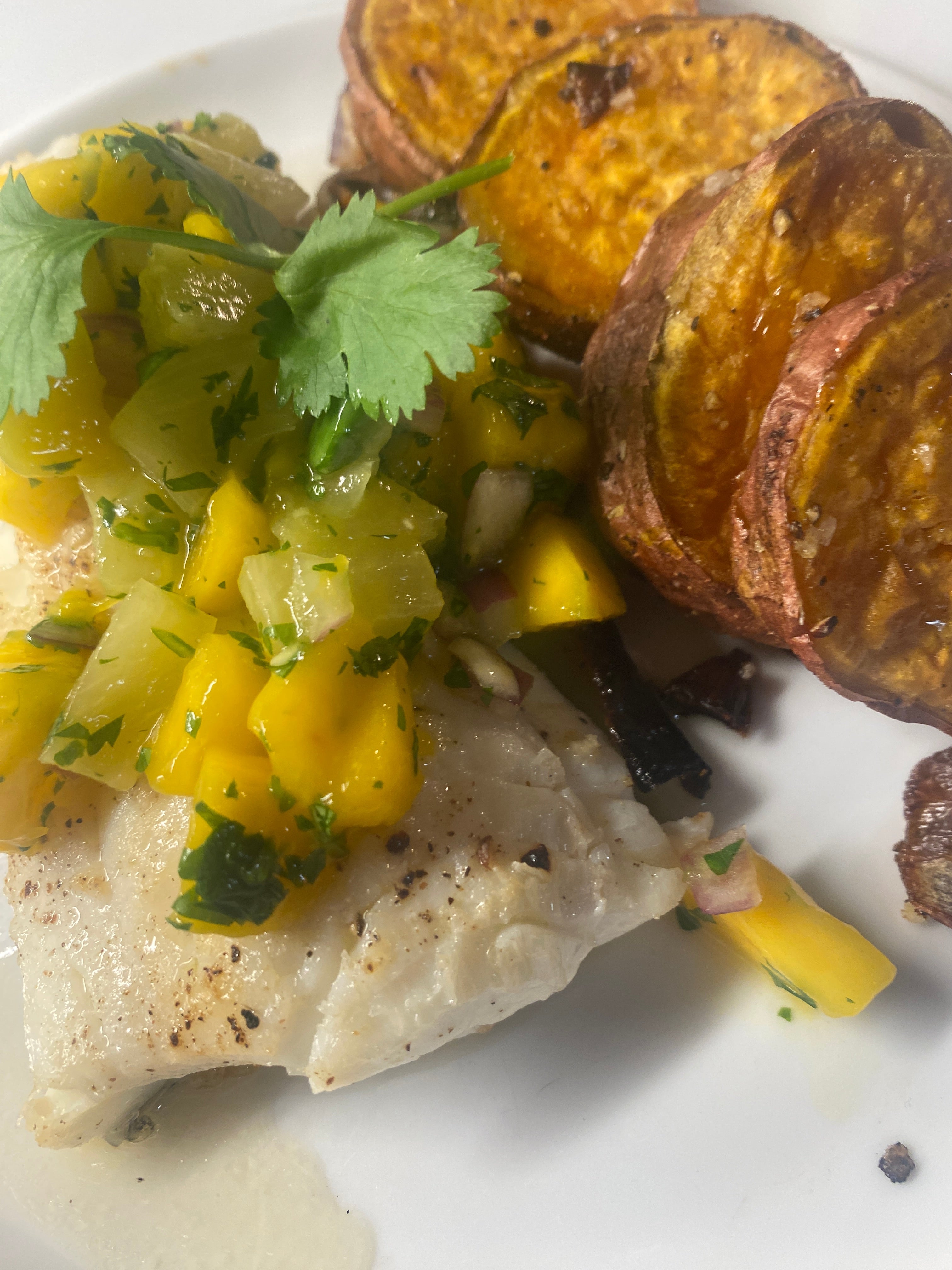 mango pineapple salsa on pan-seared cod with roasted sweet potatoes